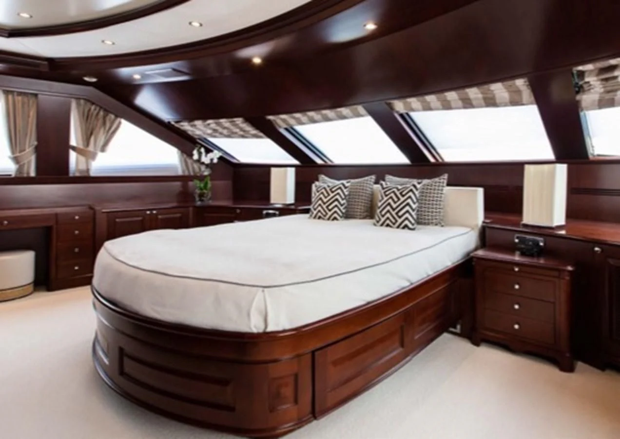 a bed in a room aboard MI AMORE JULIA Yacht for Sale