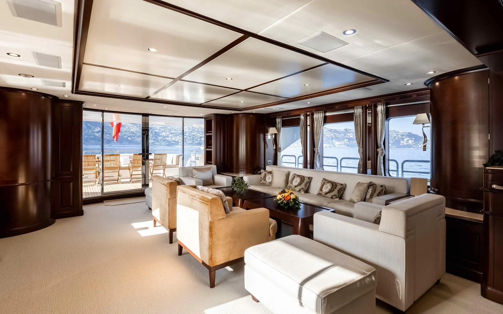 a living room with a large window aboard MI AMORE JULIA Yacht for Sale