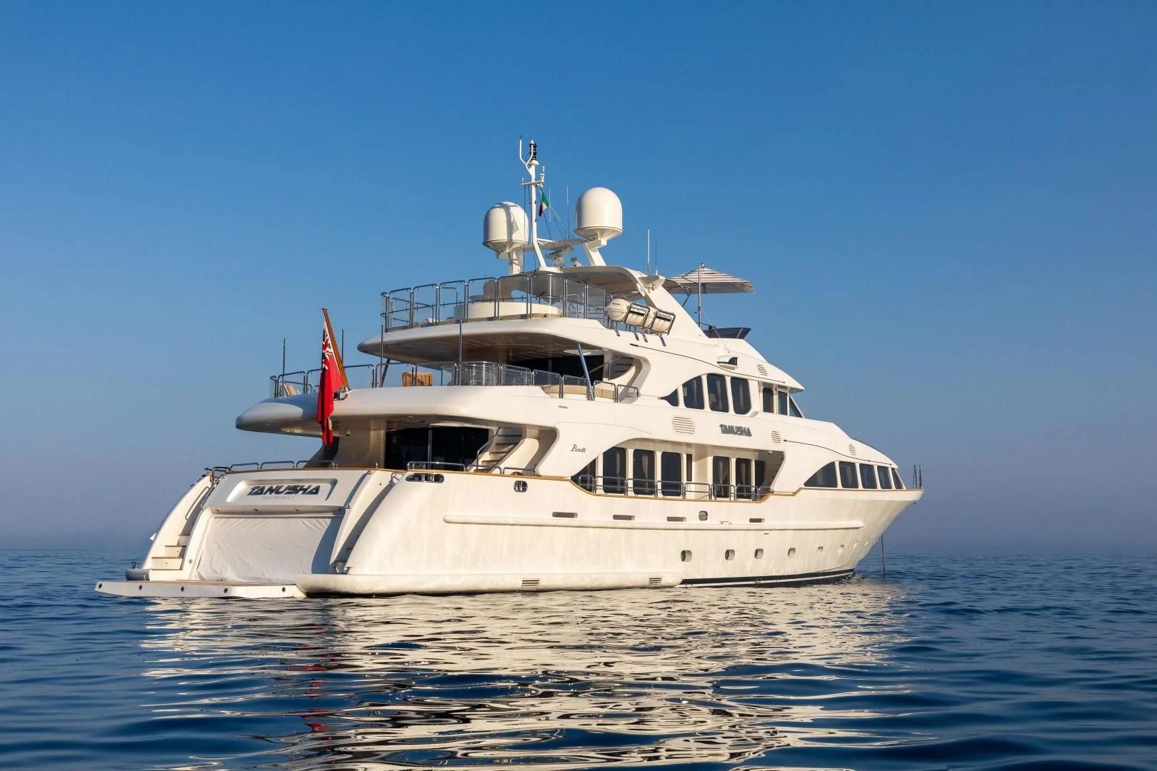 a large white boat in the water aboard MI AMORE JULIA Yacht for Sale