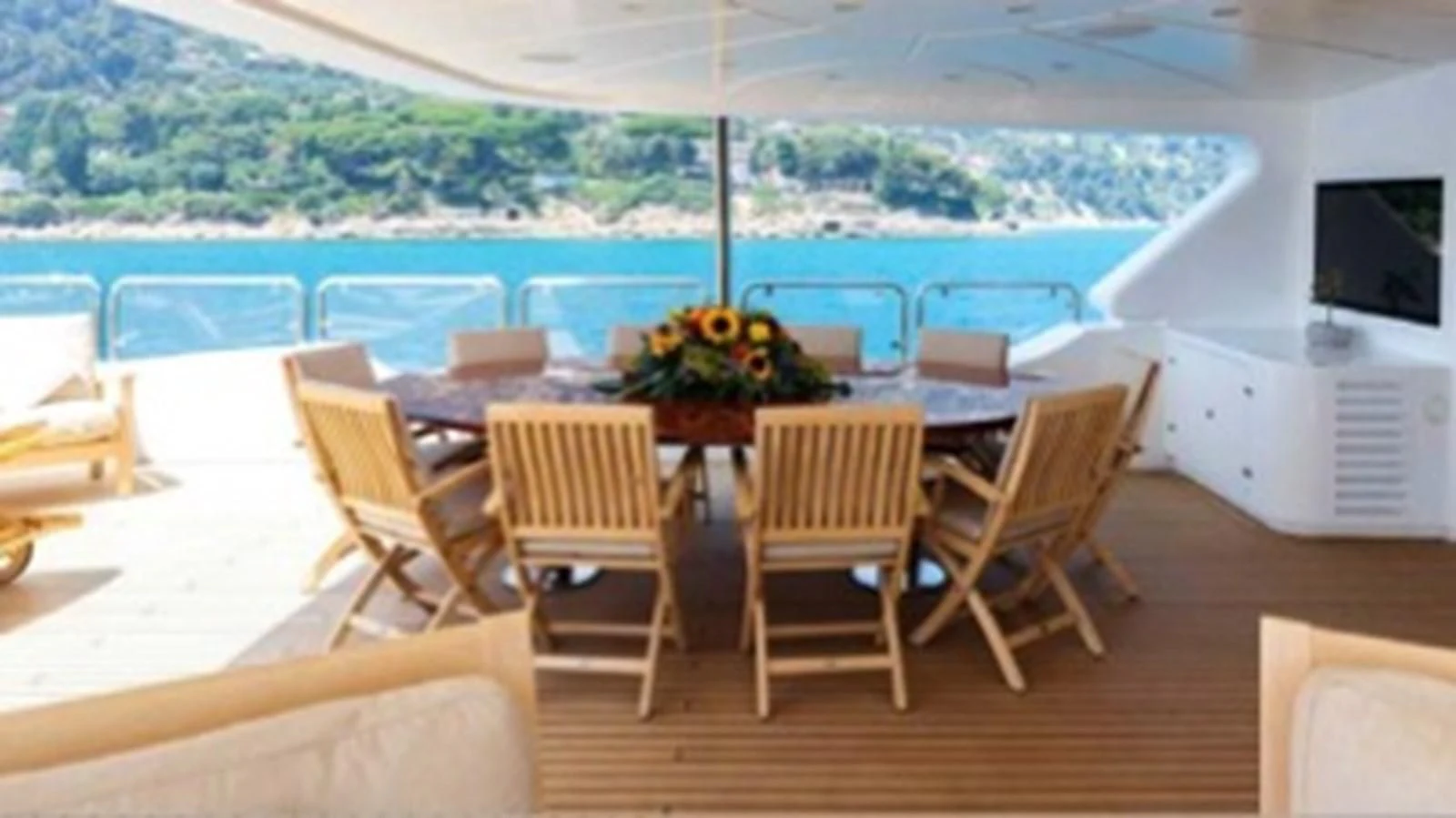 a room with a table and chairs aboard MI AMORE JULIA Yacht for Sale