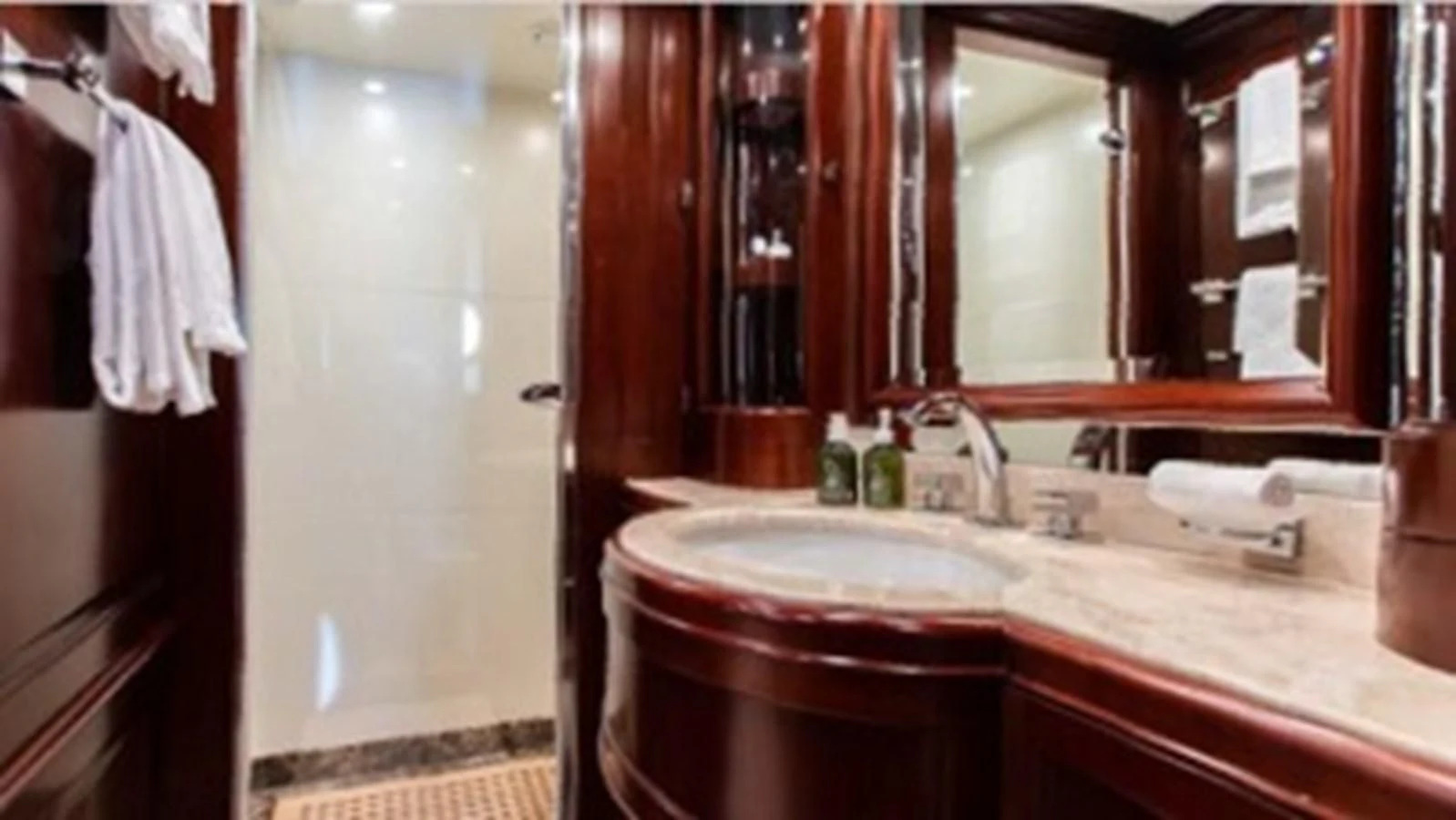 a bathroom with a sink and mirror aboard MI AMORE JULIA Yacht for Sale