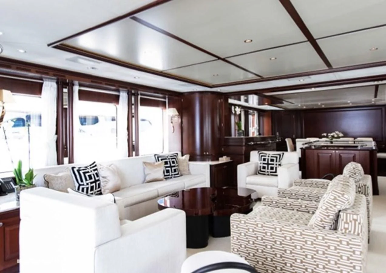 a living room with a couch and a piano aboard MI AMORE JULIA Yacht for Sale