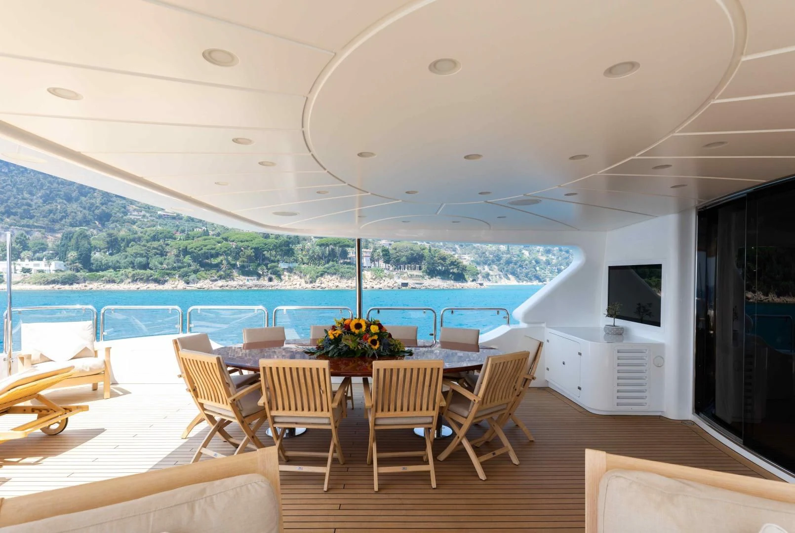 a room with a table and chairs aboard MI AMORE JULIA Yacht for Sale