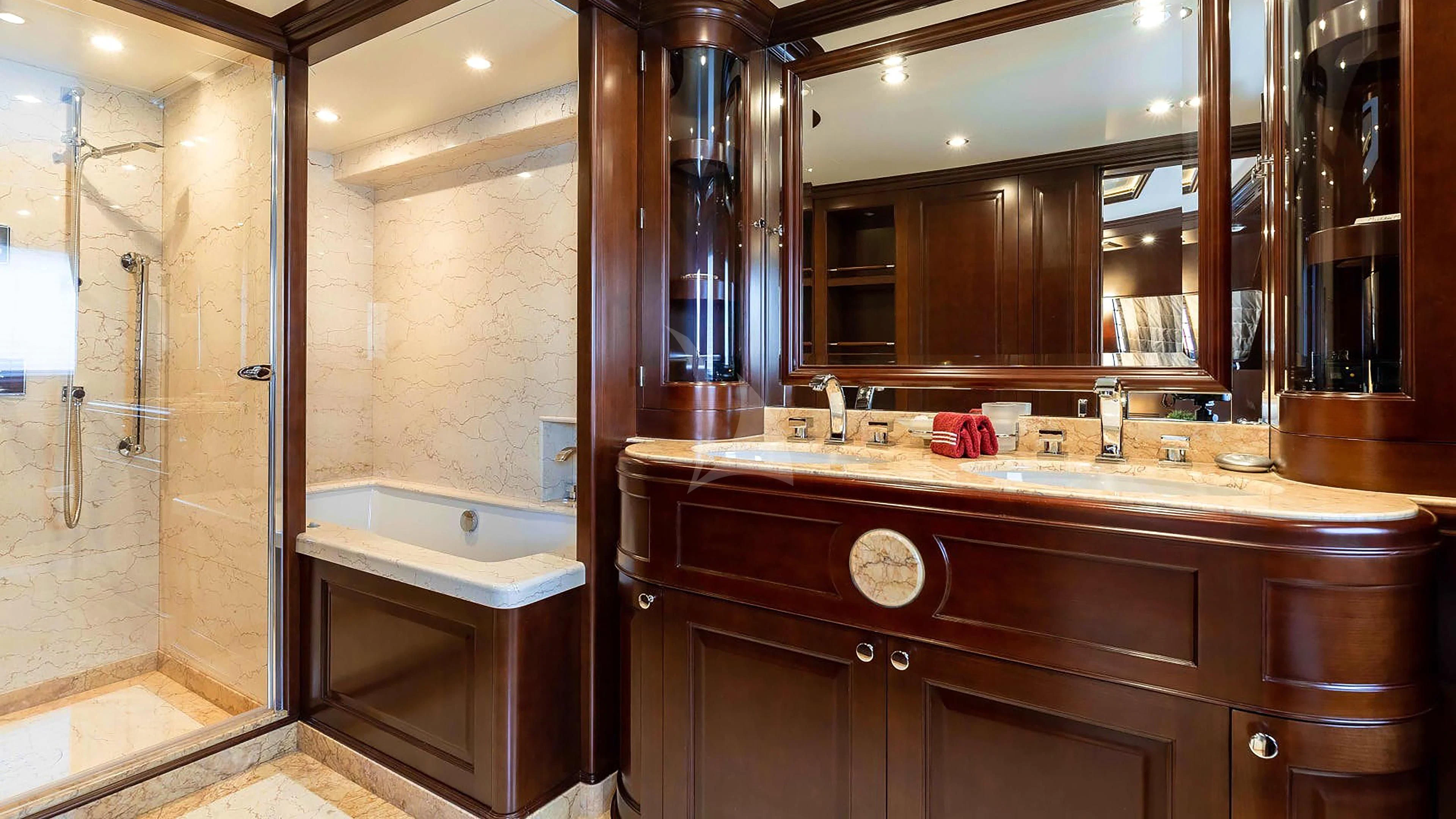 a bathroom with a large mirror aboard MI AMORE JULIA Yacht for Sale