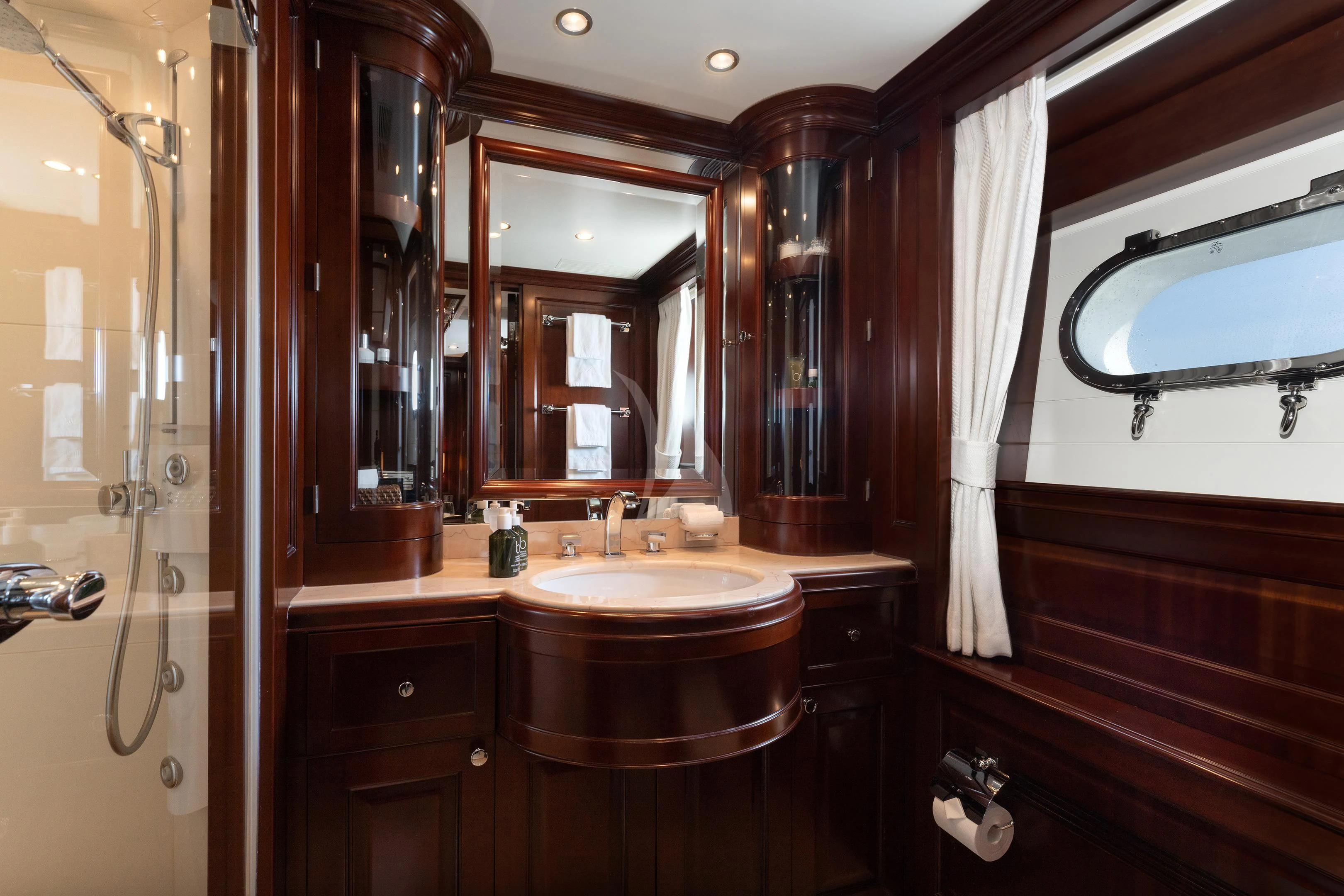 a bathroom with a sink and a mirror aboard MI AMORE JULIA Yacht for Sale