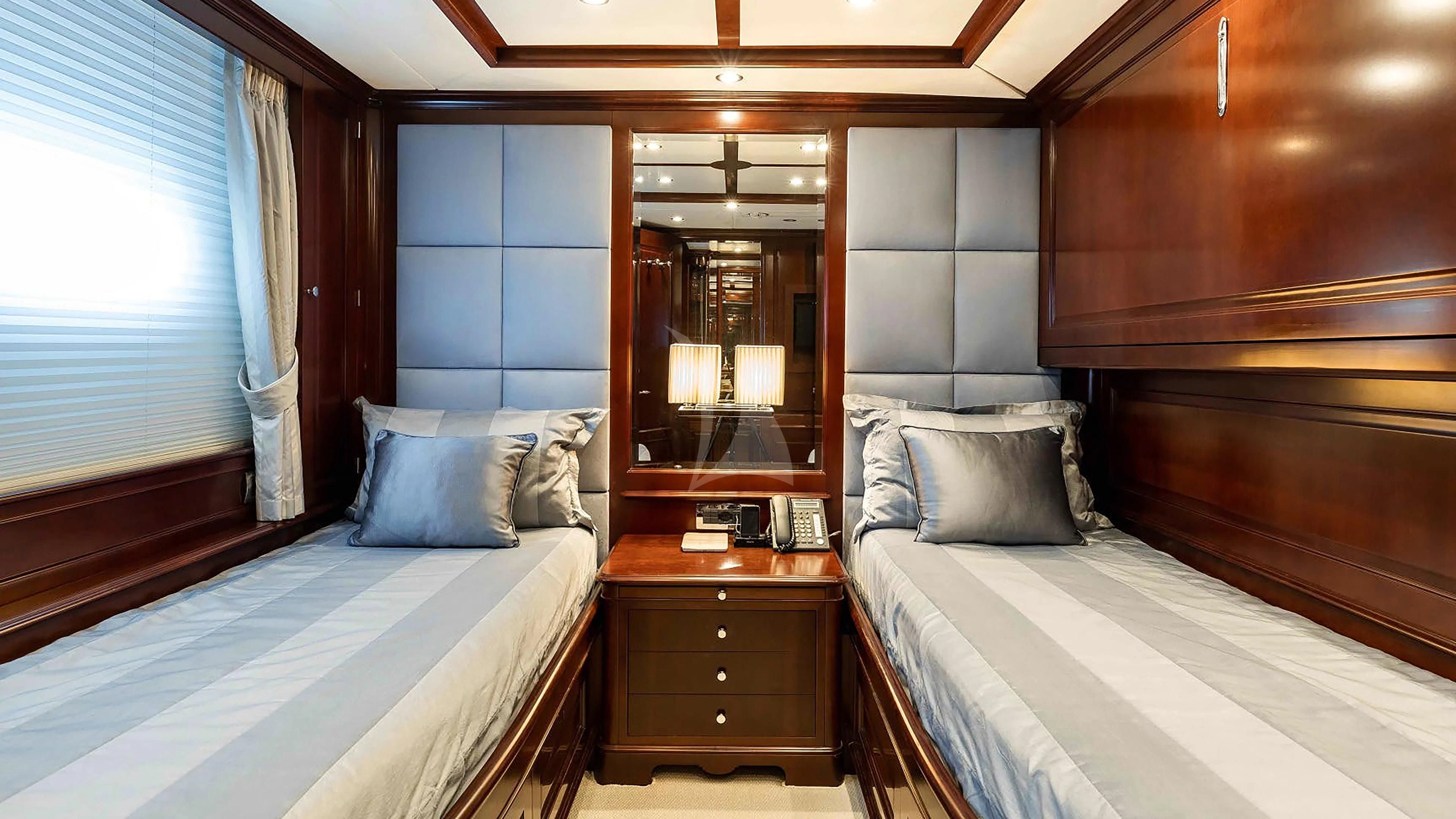 a room with two beds aboard MI AMORE JULIA Yacht for Sale