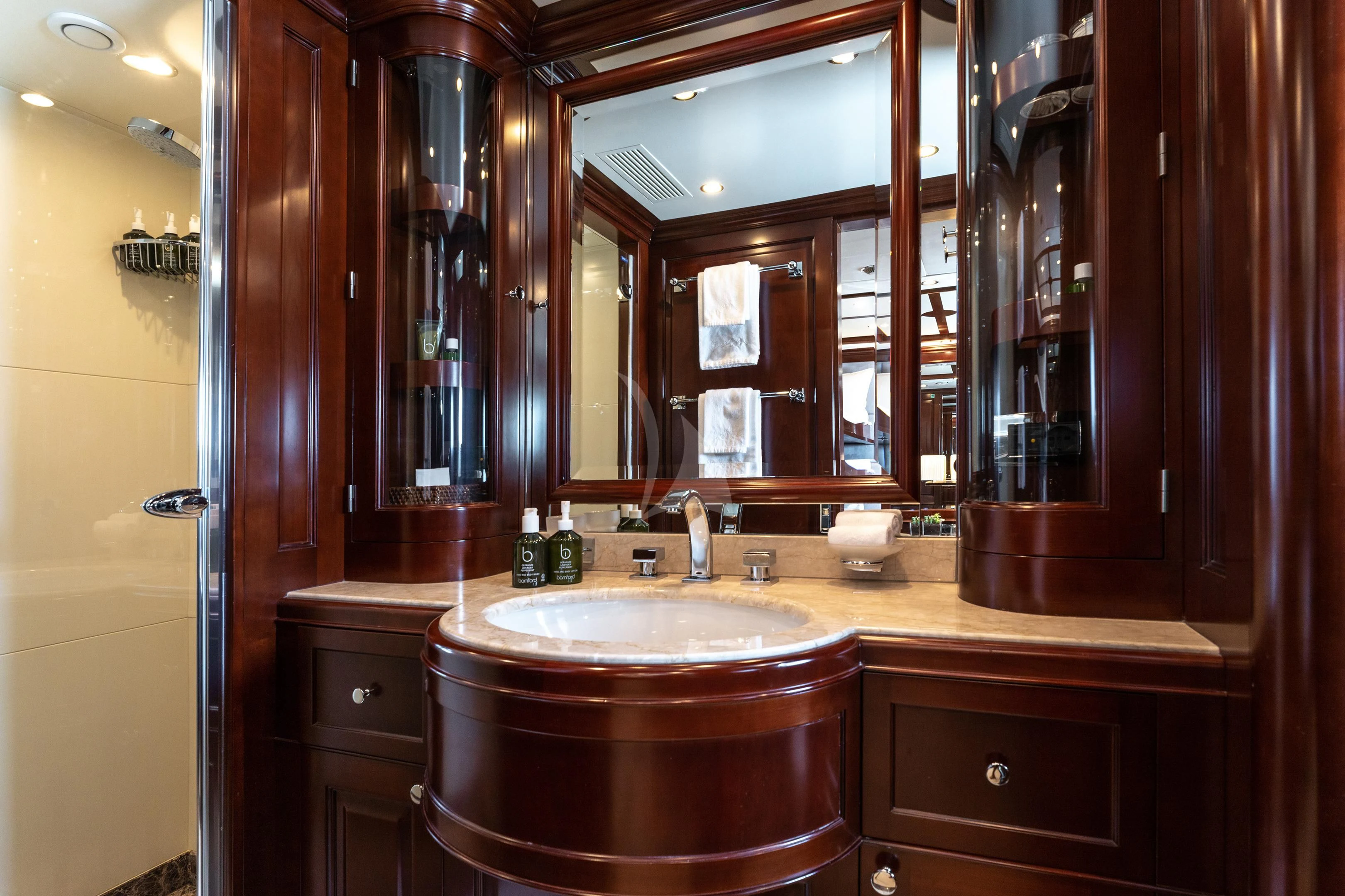 a bathroom with a large mirror aboard MI AMORE JULIA Yacht for Sale