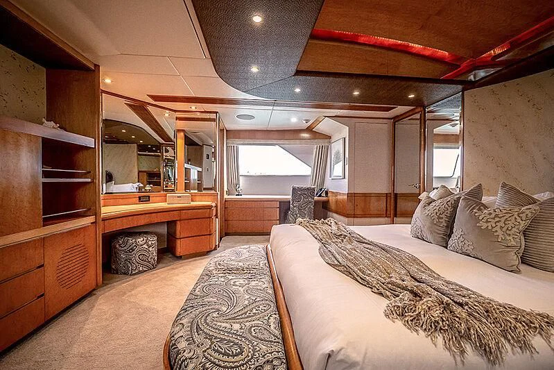 a bedroom with a large bed aboard ISLAND HEIRESS Yacht for Charter