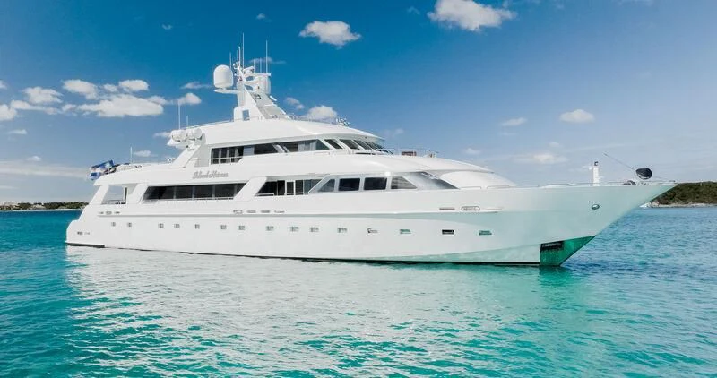 a white yacht in the water aboard ISLAND HEIRESS Yacht for Charter