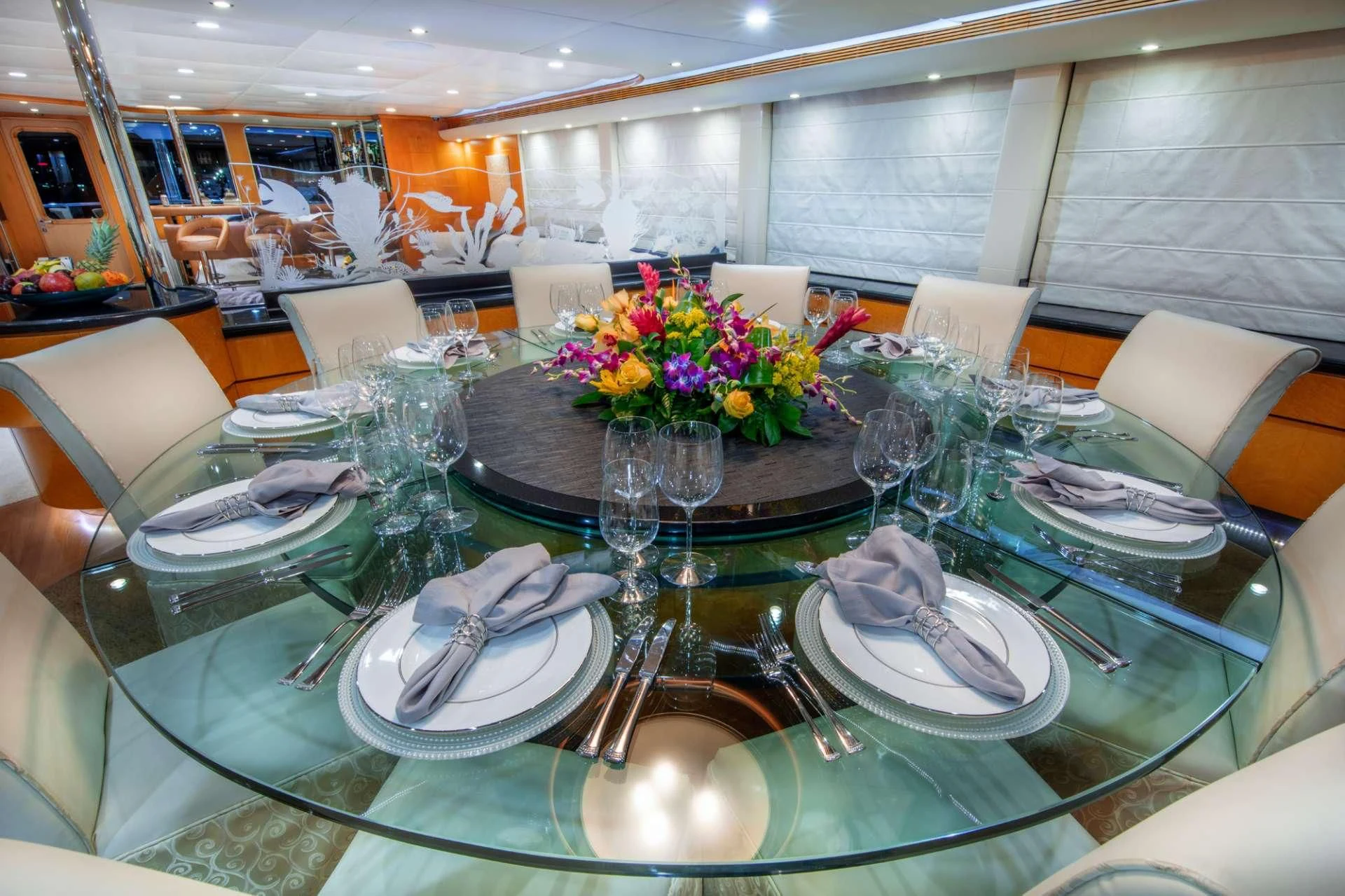 a table set with place settings aboard ISLAND HEIRESS Yacht for Charter
