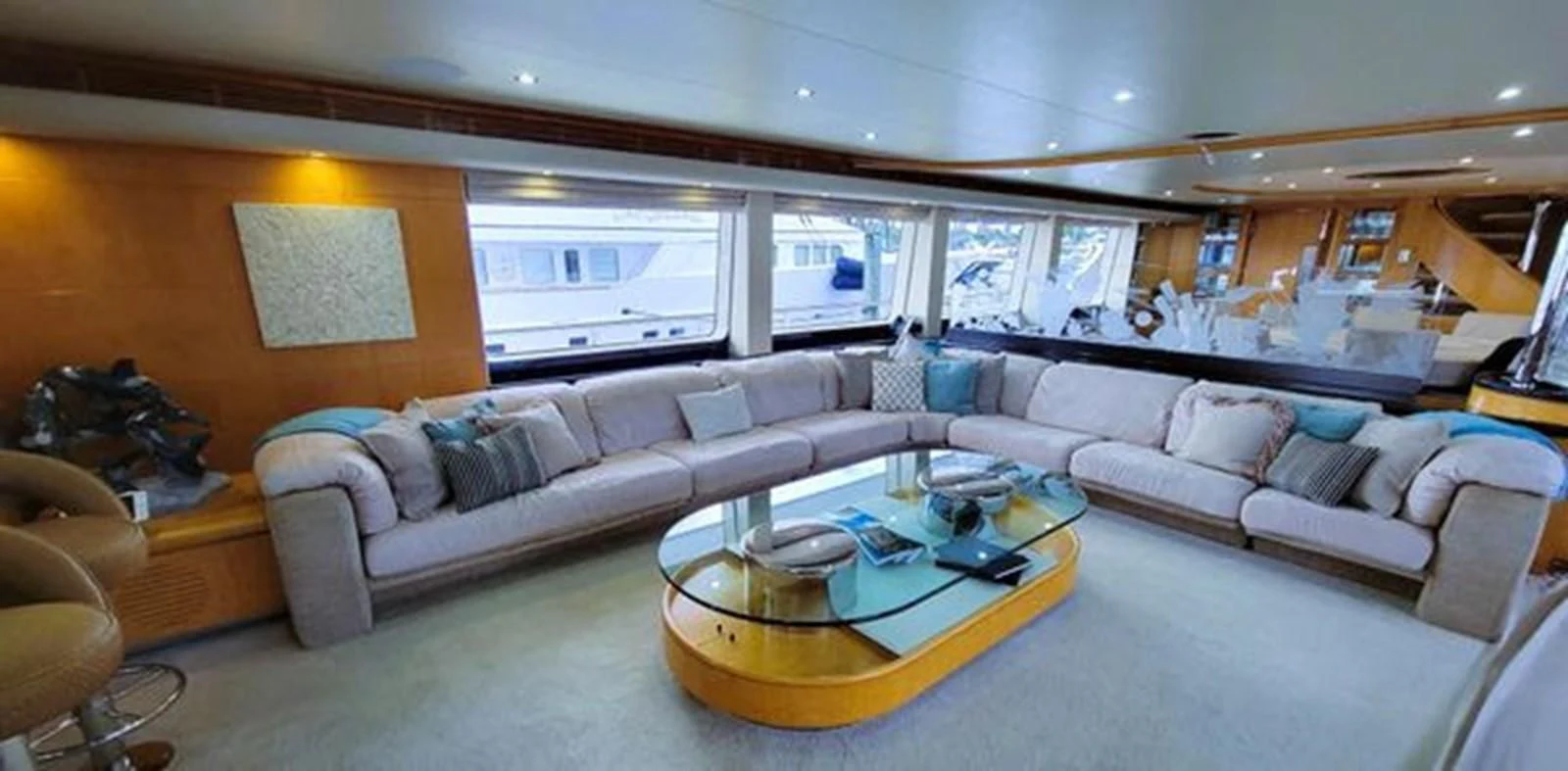 a living room with a couch and a coffee table aboard ISLAND HEIRESS Yacht for Charter