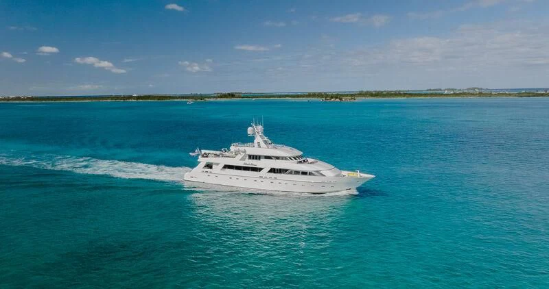 a white boat in the water aboard ISLAND HEIRESS Yacht for Charter