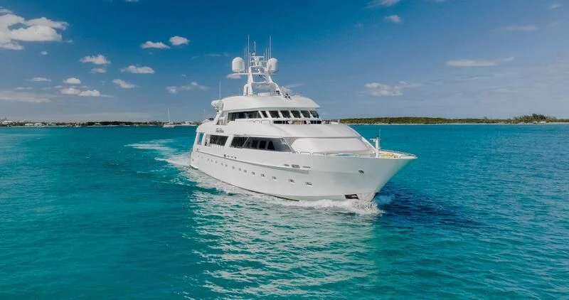 a white boat in the water aboard ISLAND HEIRESS Yacht for Charter