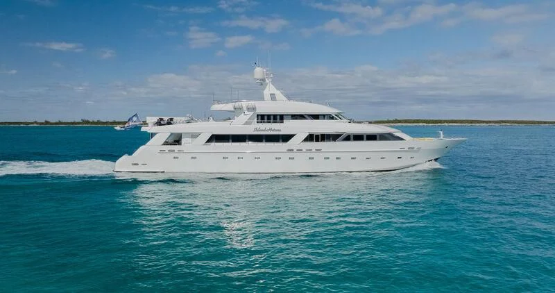 a white boat in the water aboard ISLAND HEIRESS Yacht for Charter