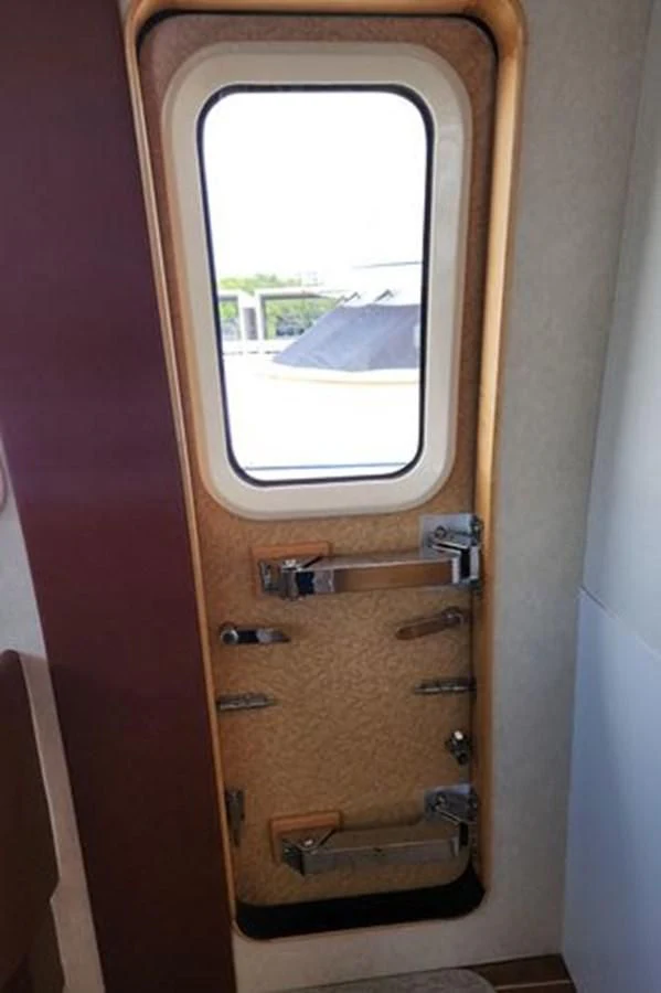 a door with a window aboard ISLAND HEIRESS Yacht for Charter