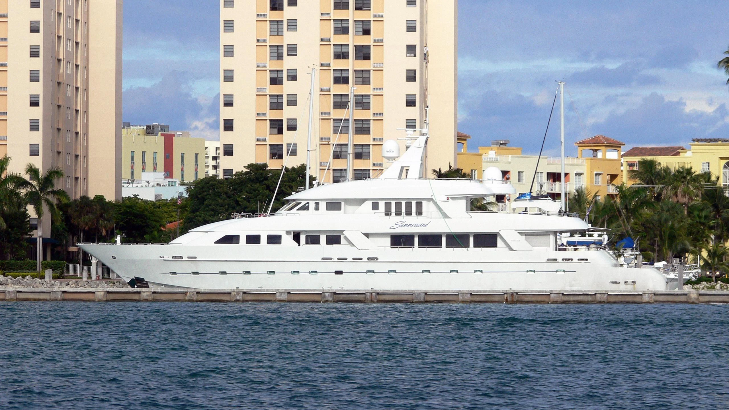 a large white boat in the water aboard ISLAND HEIRESS Yacht for Charter
