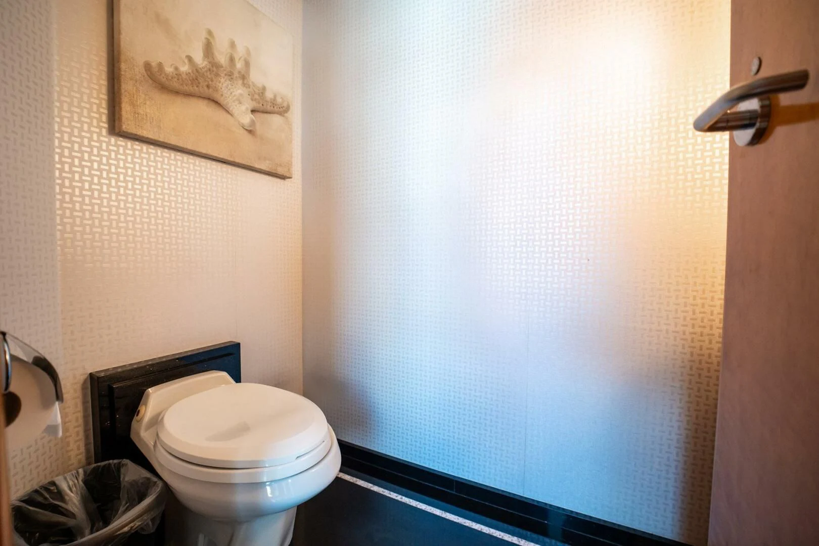 a toilet in a bathroom aboard ISLAND HEIRESS Yacht for Charter