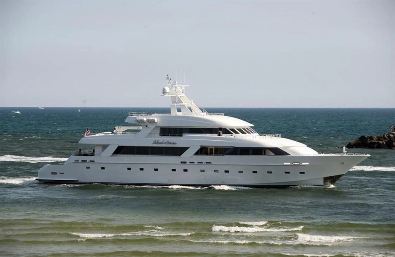 a white yacht in the ocean aboard ISLAND HEIRESS Yacht for Charter