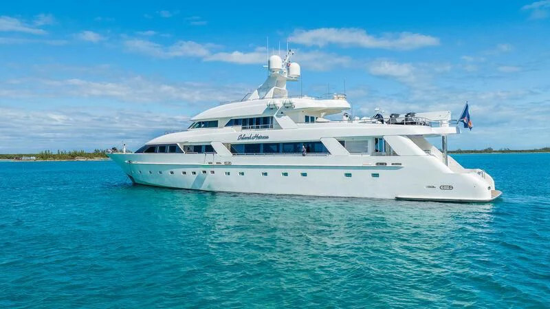 a white yacht in the water aboard ISLAND HEIRESS Yacht for Charter