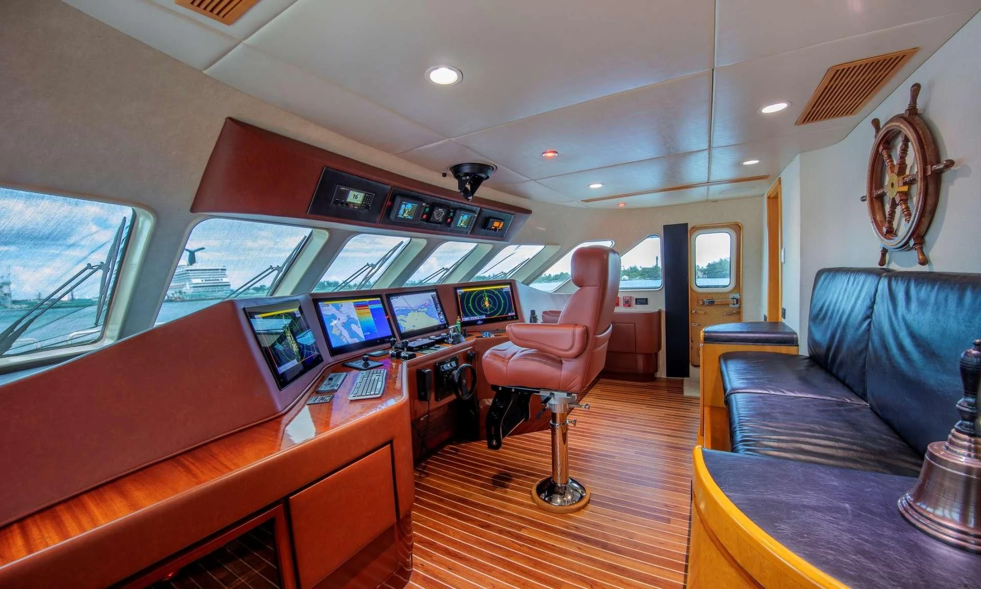 a living room with a couch and a tv aboard ISLAND HEIRESS Yacht for Charter
