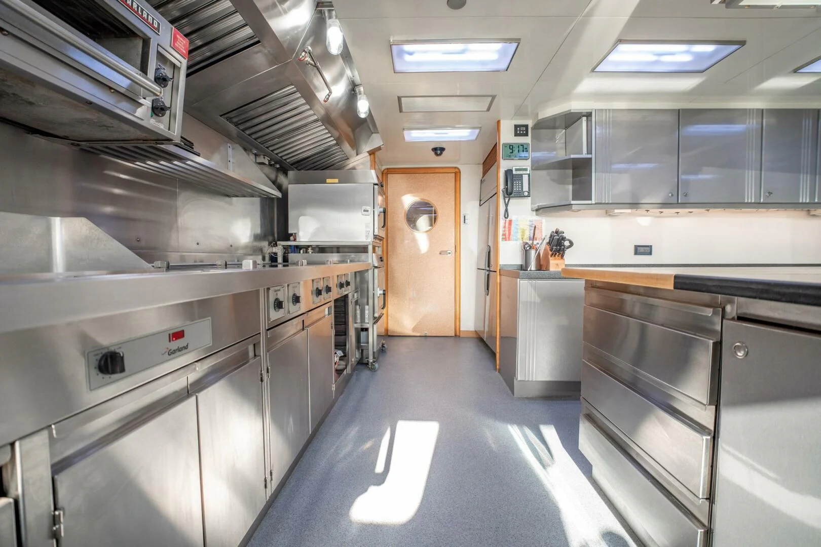 a kitchen with stainless steel appliances aboard ISLAND HEIRESS Yacht for Charter