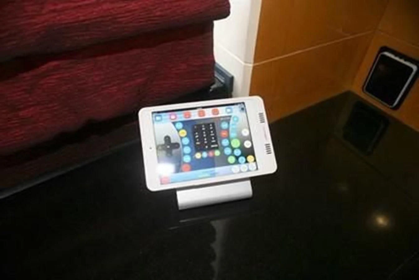 a cell phone on a table aboard ISLAND HEIRESS Yacht for Charter