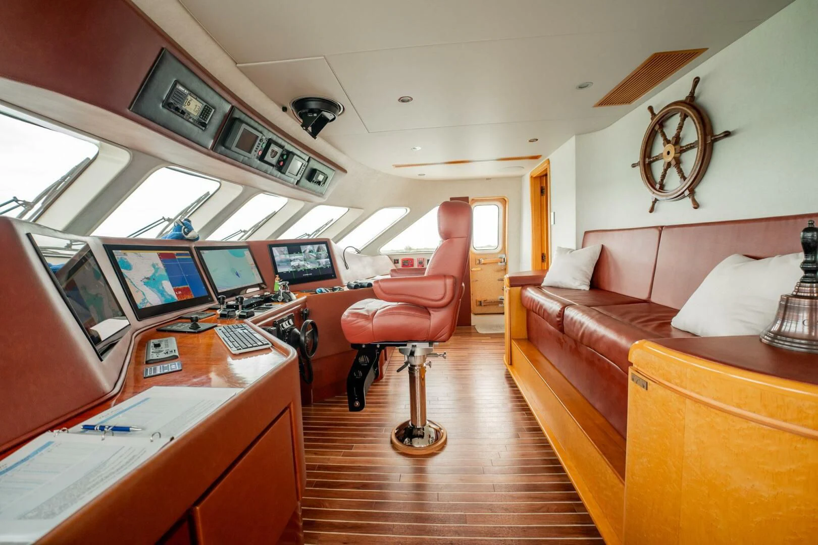a room with a desk and chairs aboard ISLAND HEIRESS Yacht for Charter