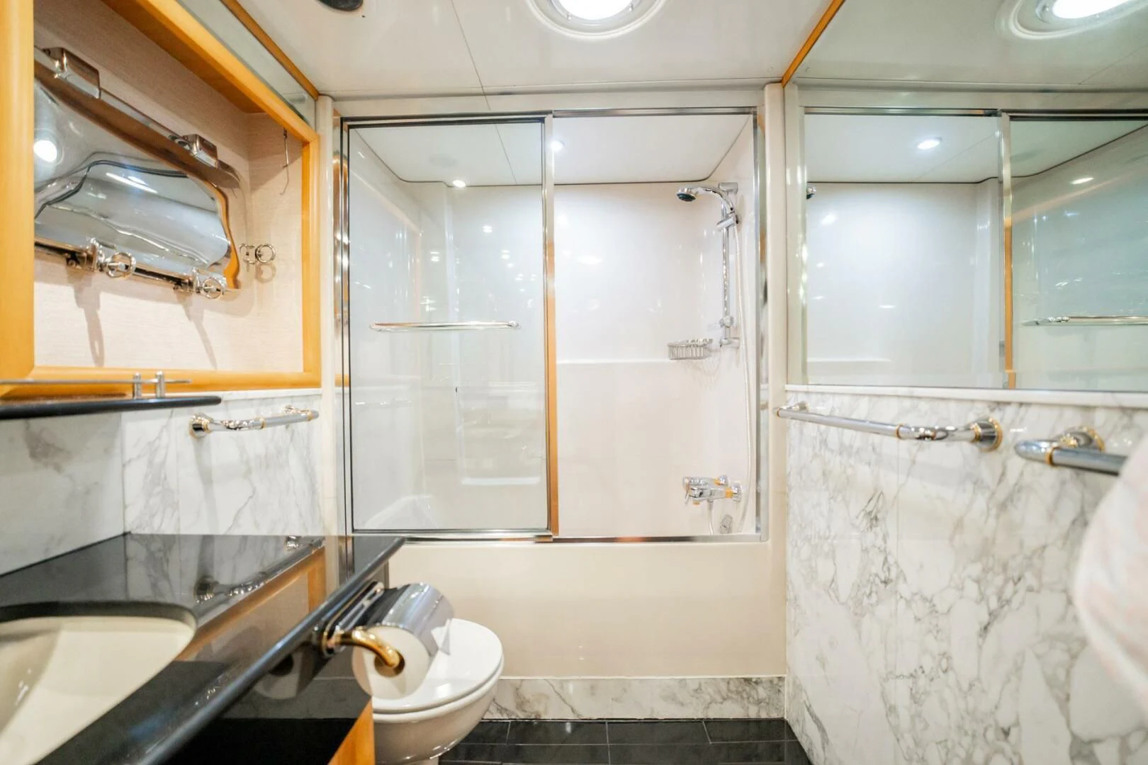 a bathroom with a shower and toilet aboard ISLAND HEIRESS Yacht for Charter