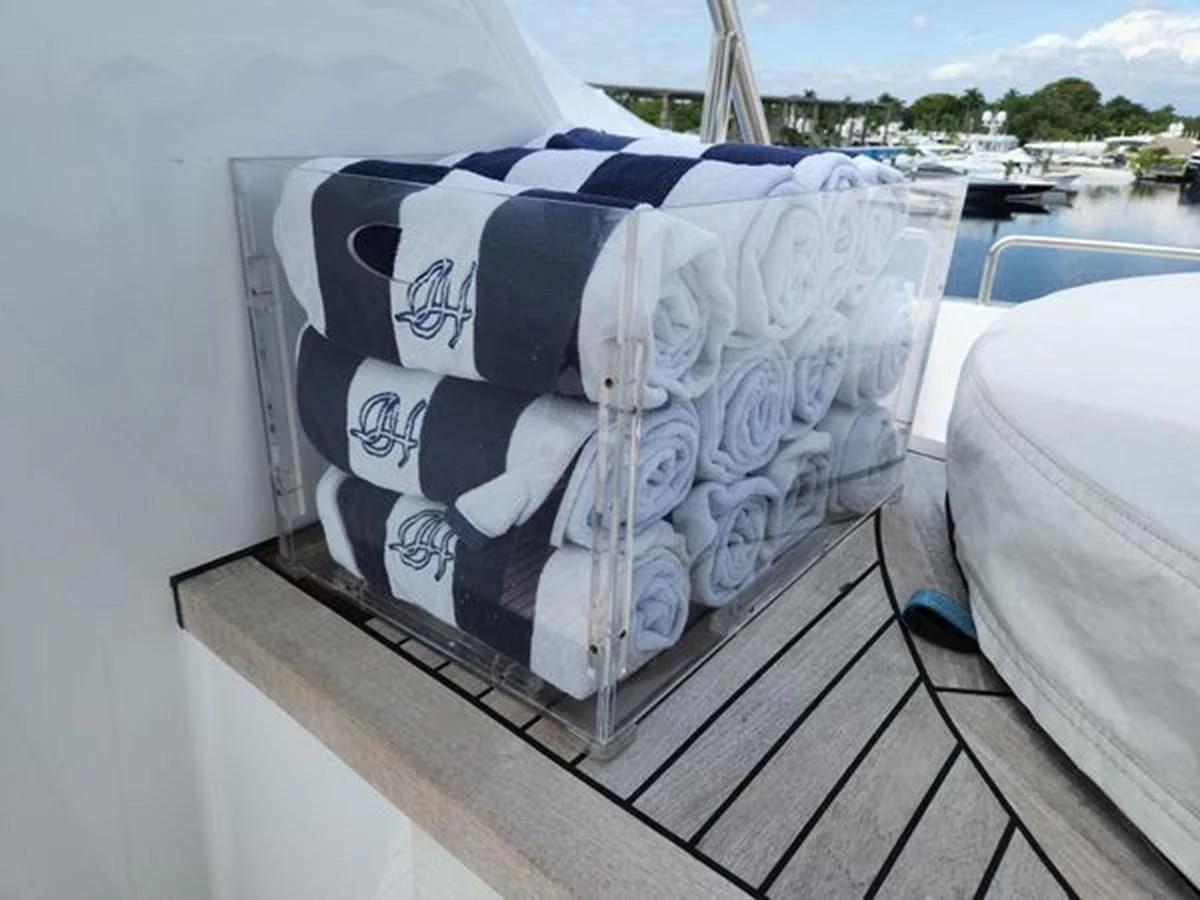 a white couch on a dock aboard ISLAND HEIRESS Yacht for Charter