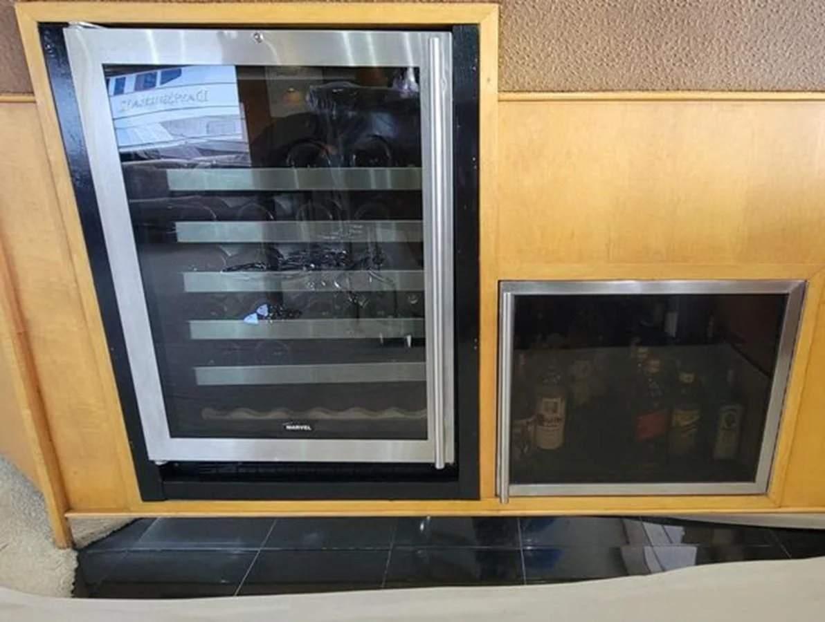 a glass case with a picture on it aboard ISLAND HEIRESS Yacht for Charter