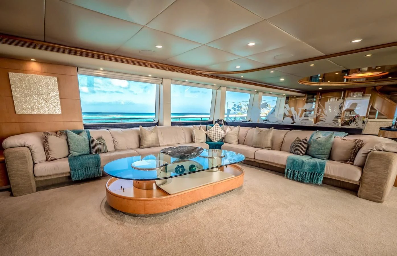 a living room with a large window aboard ISLAND HEIRESS Yacht for Charter