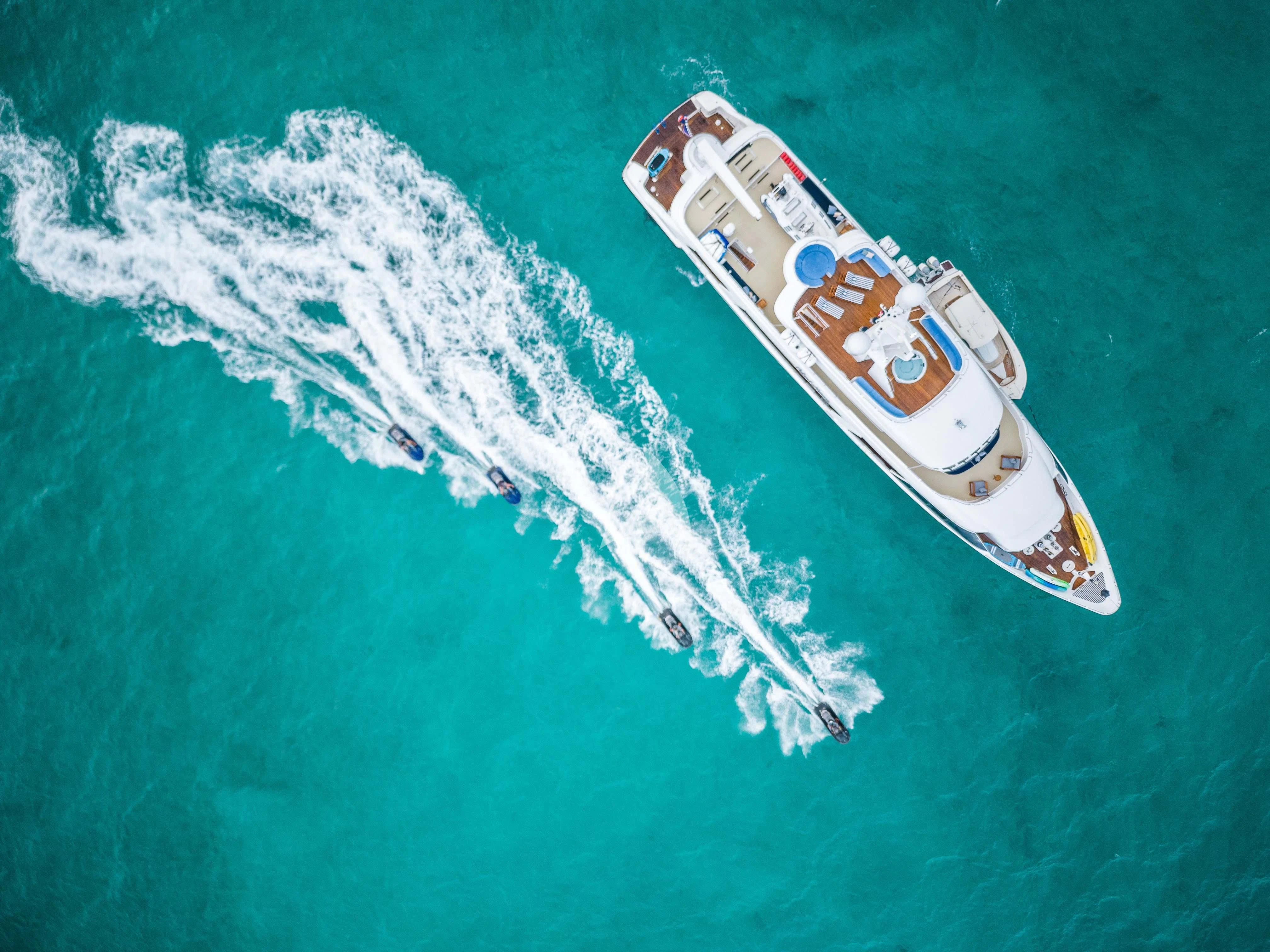 a white boat in the ocean aboard ISLAND HEIRESS Yacht for Charter