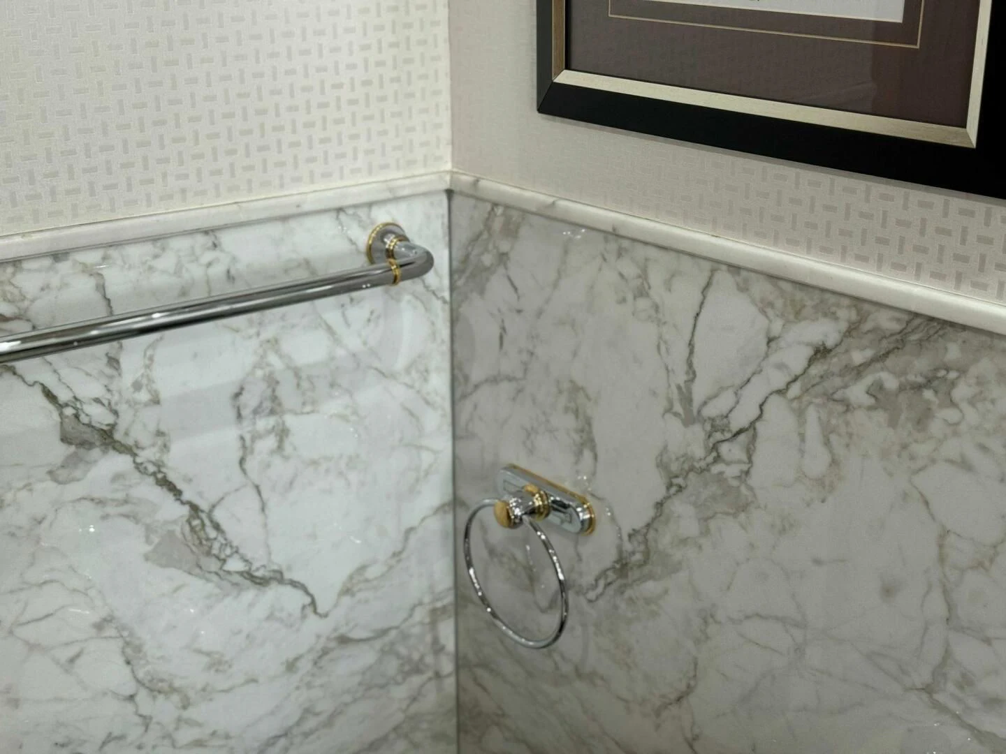 a wall with a pipe and a picture on it aboard ISLAND HEIRESS Yacht for Charter