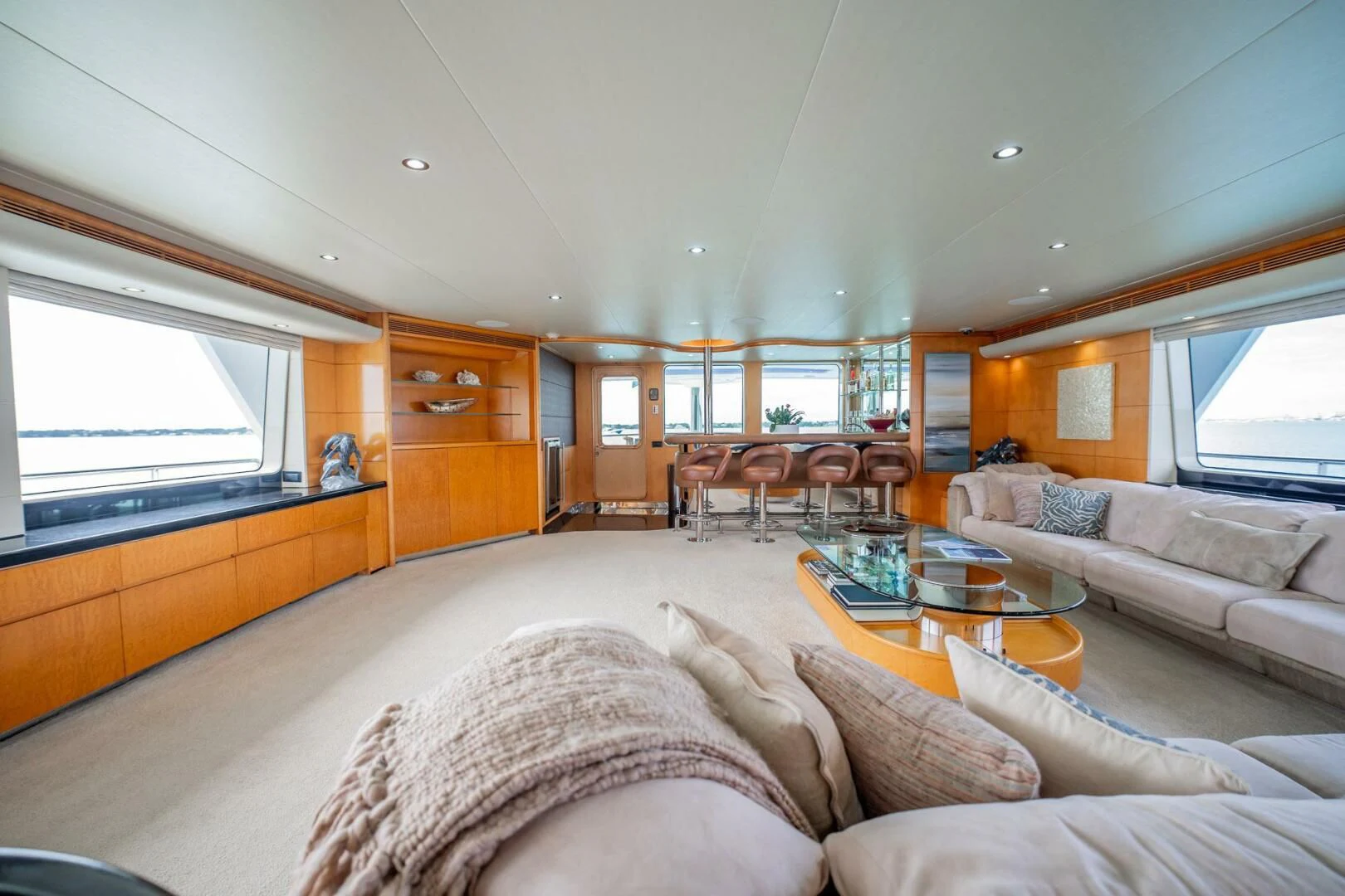 a living room with a couch and a coffee table aboard ISLAND HEIRESS Yacht for Charter