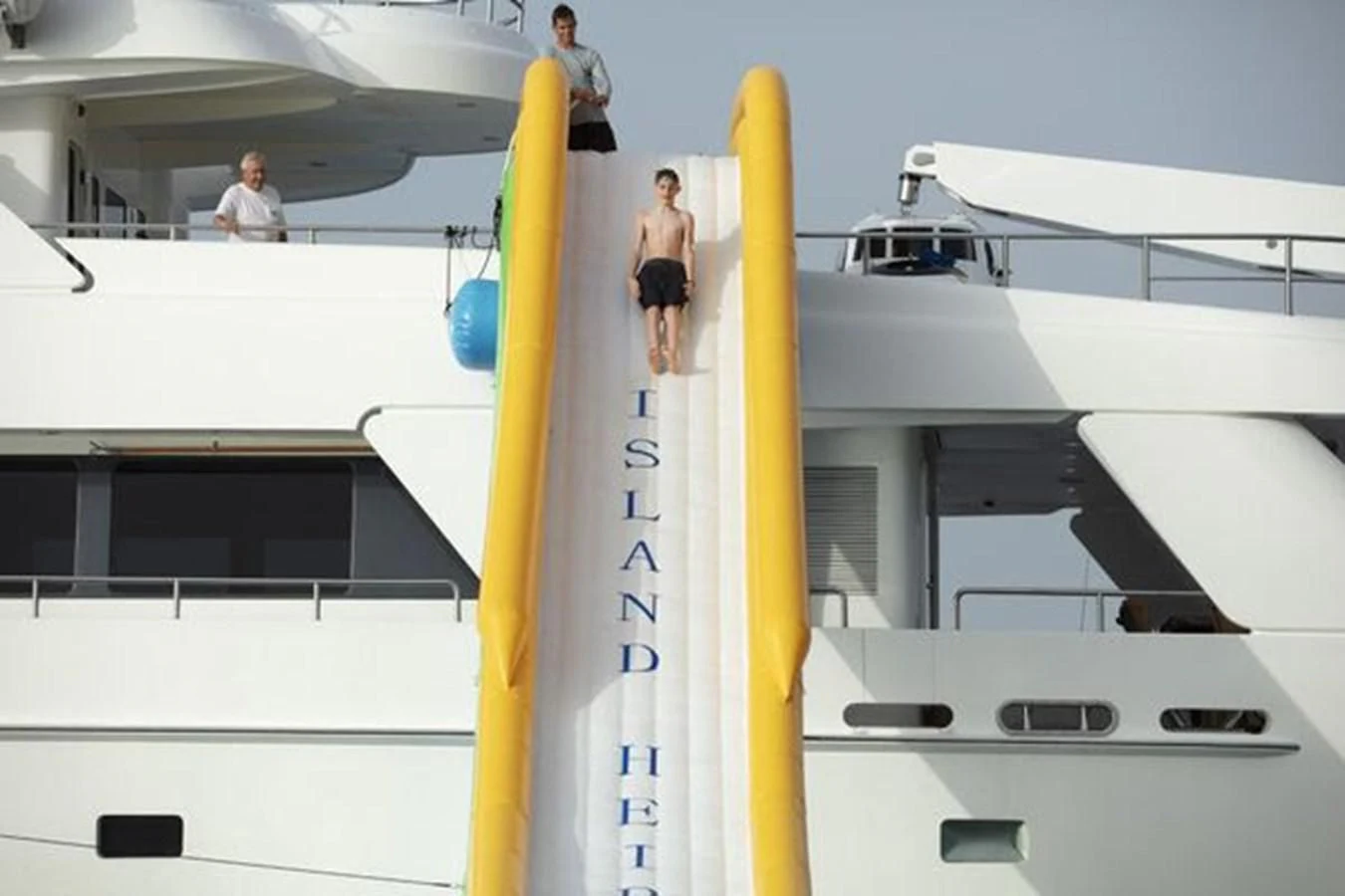 a surfboard on a yellow pole aboard ISLAND HEIRESS Yacht for Charter