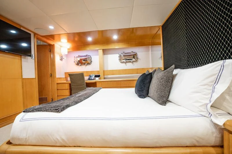 a bed with pillows and pillows aboard ISLAND HEIRESS Yacht for Charter