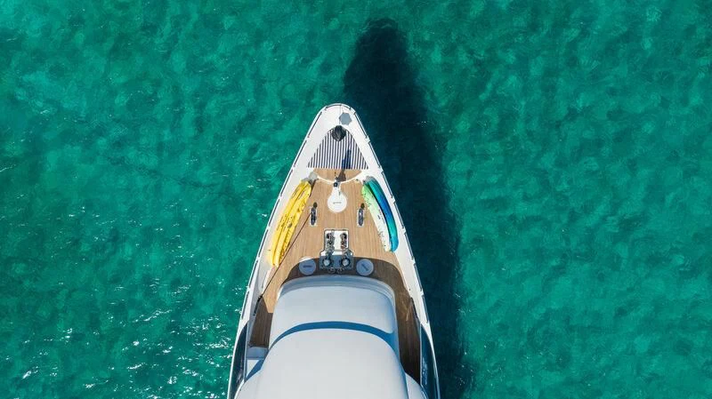 a small boat in a body of water aboard ISLAND HEIRESS Yacht for Charter