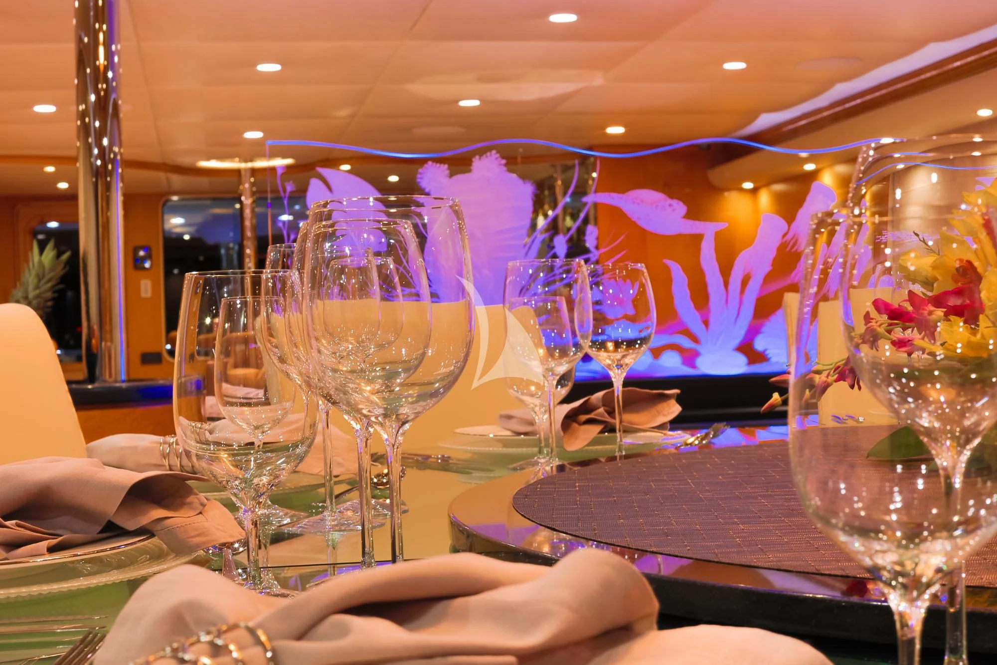 a table with many wine glasses aboard ISLAND HEIRESS Yacht for Charter