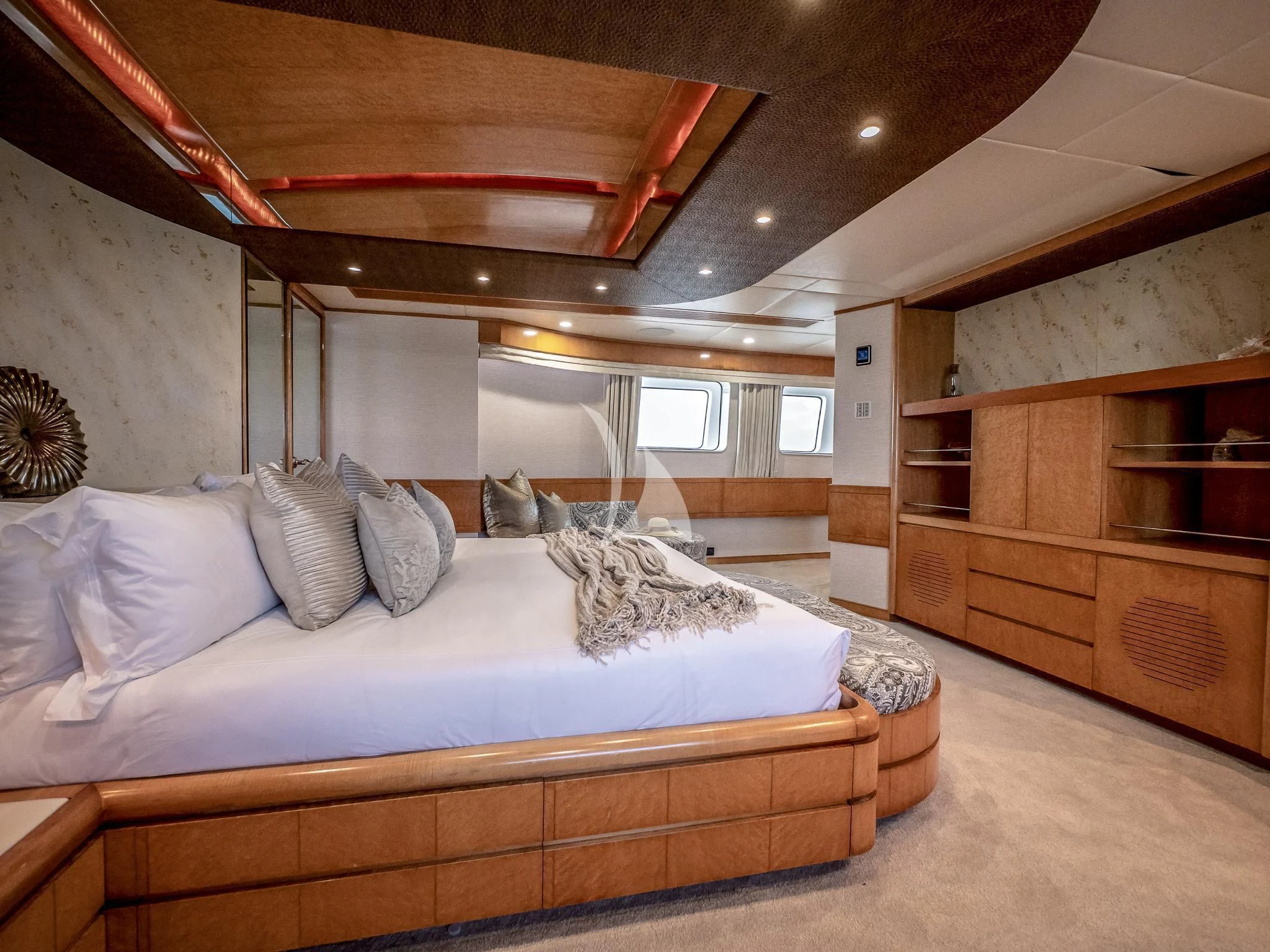 a bedroom with a large bed aboard ISLAND HEIRESS Yacht for Charter