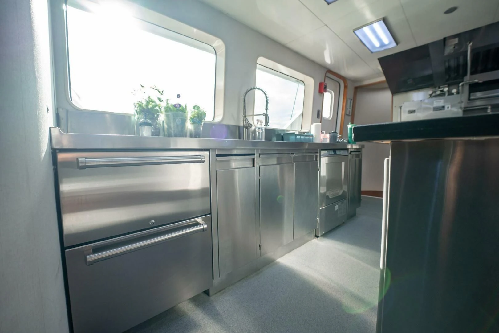a kitchen with stainless steel appliances aboard ISLAND HEIRESS Yacht for Charter