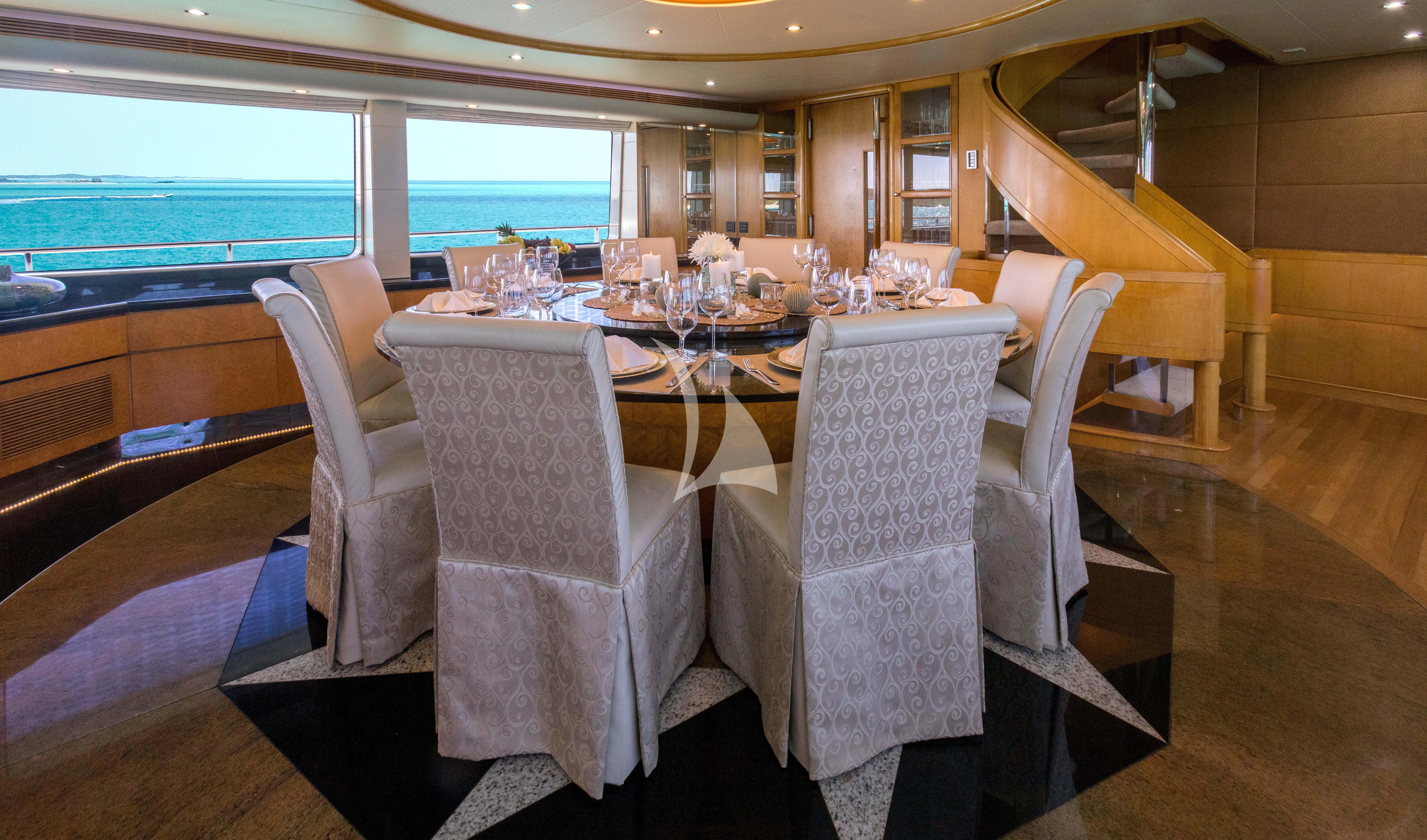 a table set for a dinner aboard ISLAND HEIRESS Yacht for Charter