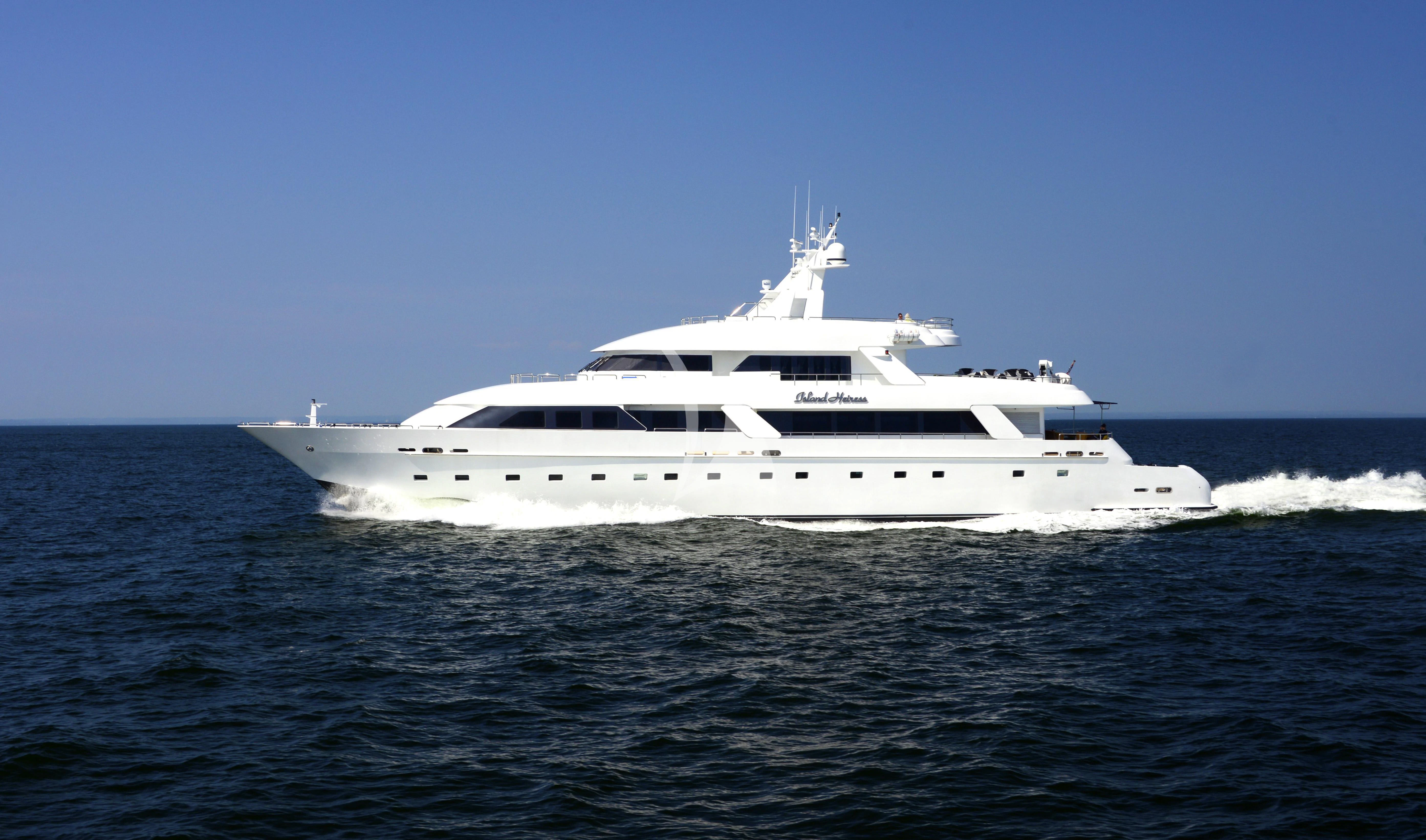a white yacht on the water aboard ISLAND HEIRESS Yacht for Charter