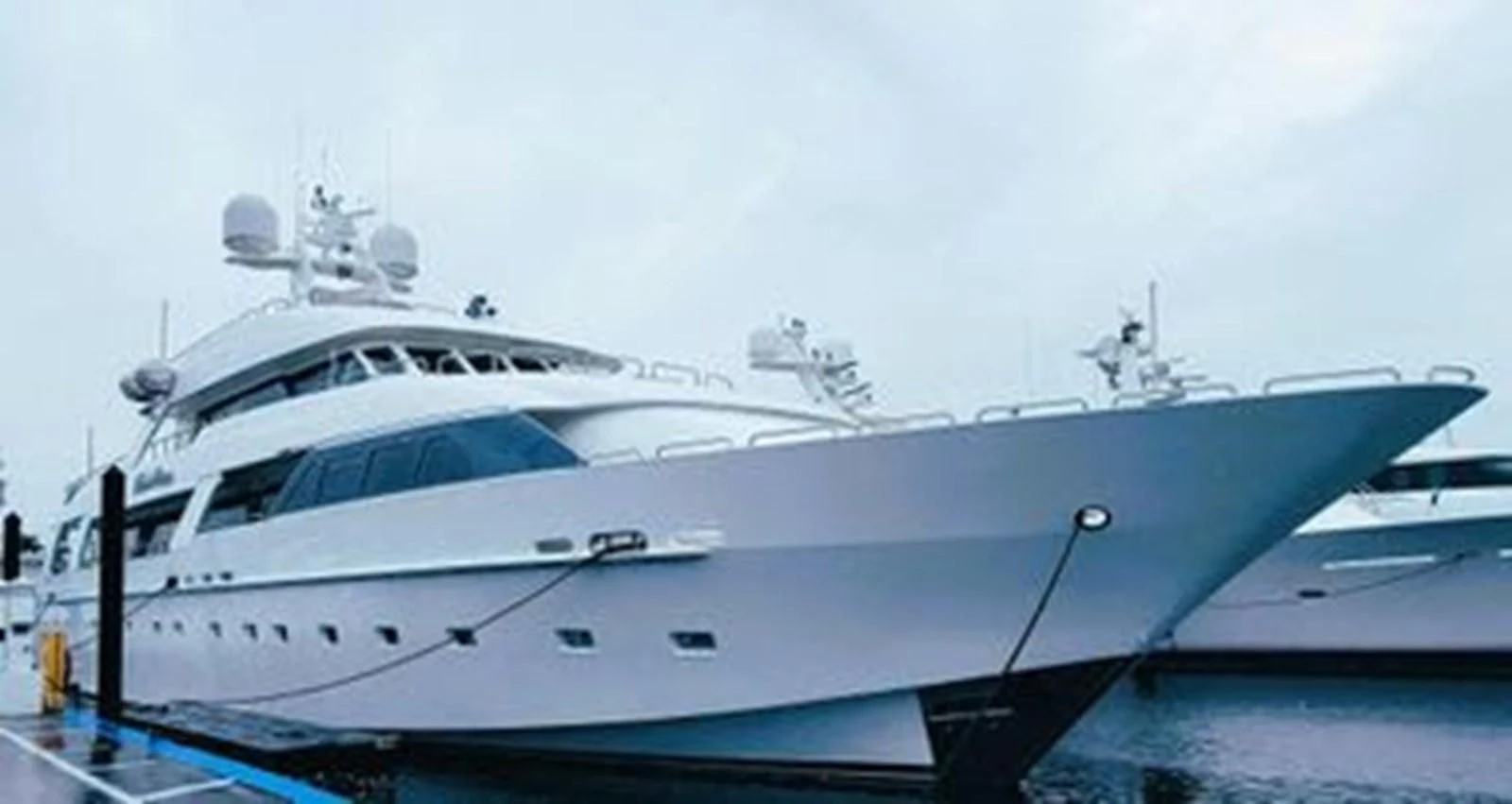 a white yacht in the water aboard ISLAND HEIRESS Yacht for Charter