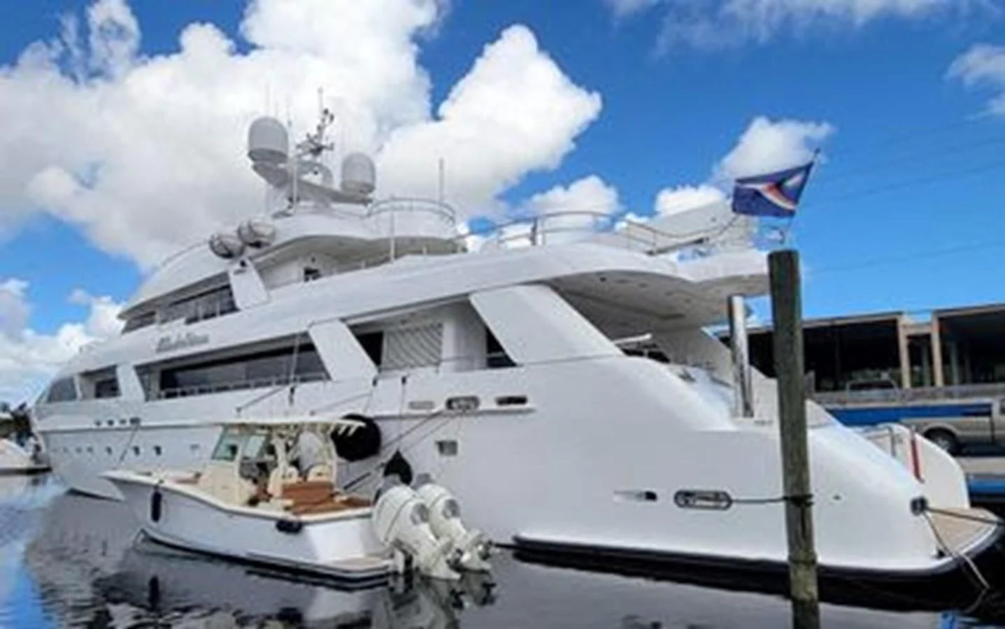 a boat docked at a pier aboard ISLAND HEIRESS Yacht for Charter