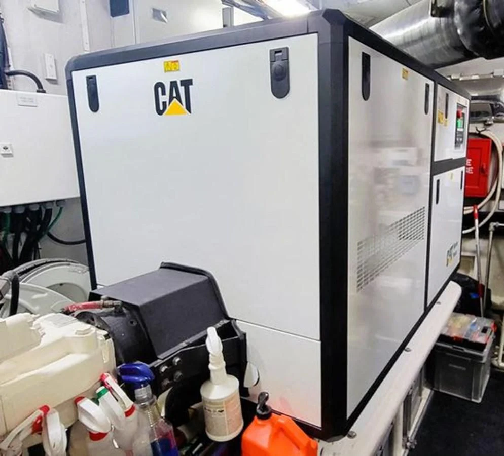 a large white machine with black wheels aboard ISLAND HEIRESS Yacht for Charter