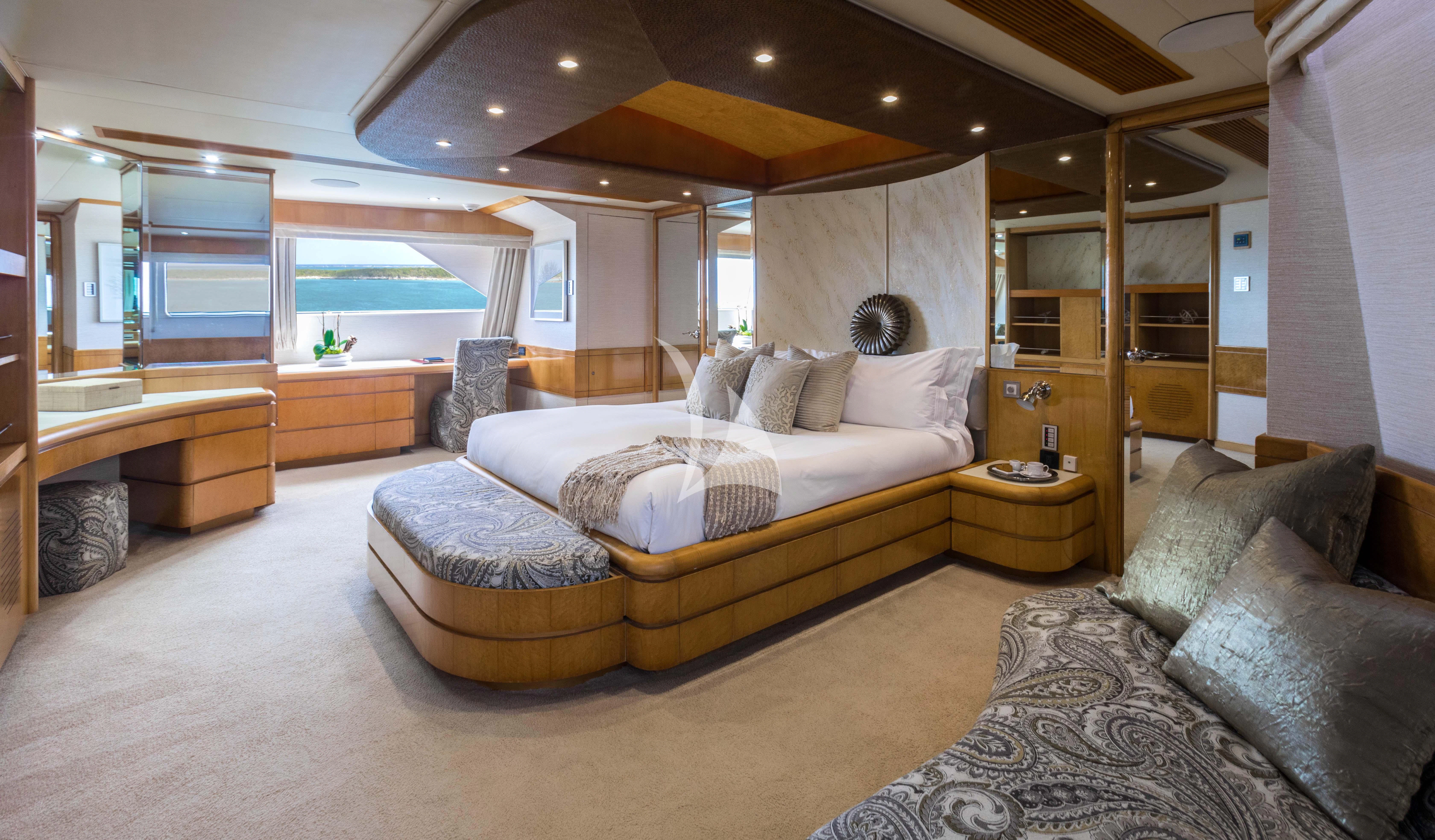 a large bedroom with a large bed aboard ISLAND HEIRESS Yacht for Charter