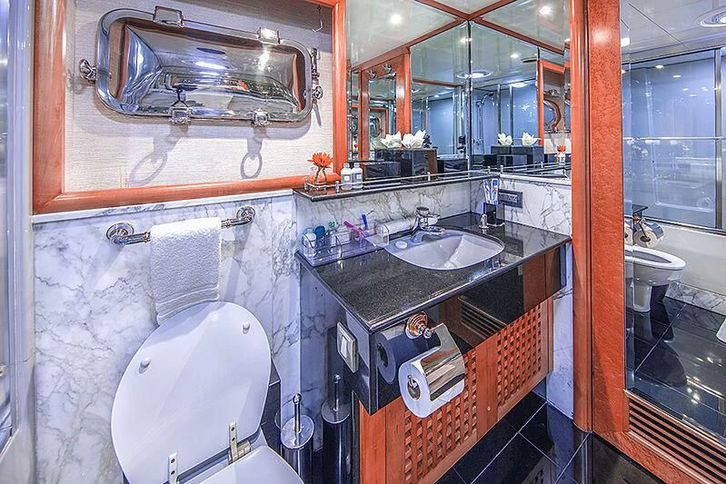 a bathroom with a sink and a toilet aboard ISLAND HEIRESS Yacht for Charter