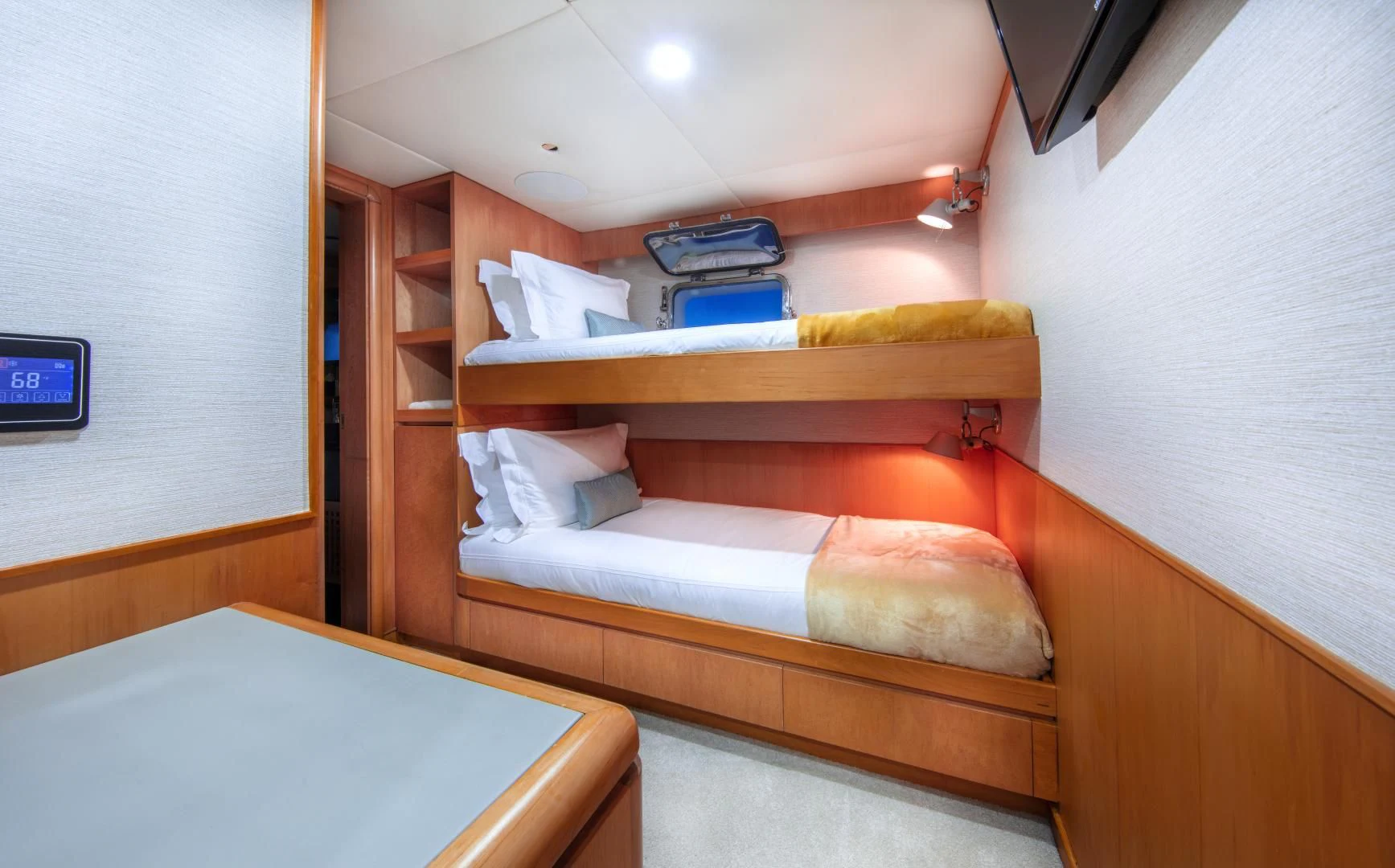a bed in a room aboard ISLAND HEIRESS Yacht for Charter