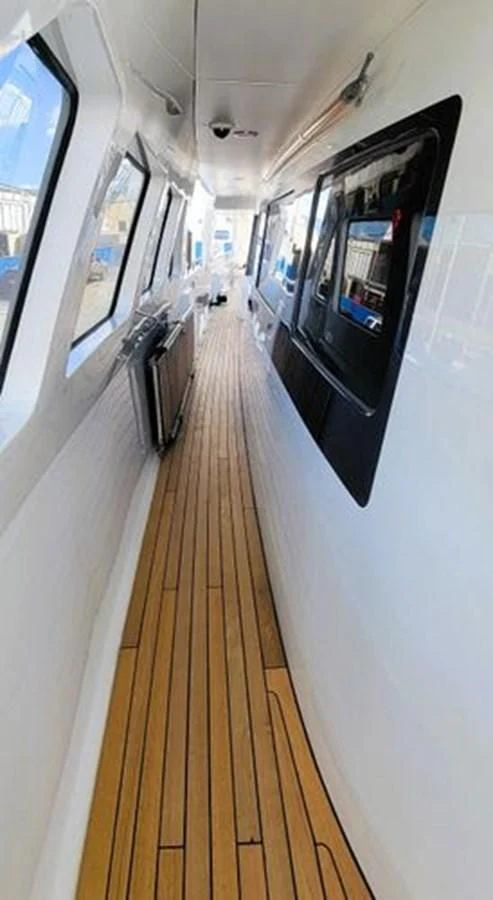 a hallway with a large mirror aboard ISLAND HEIRESS Yacht for Charter