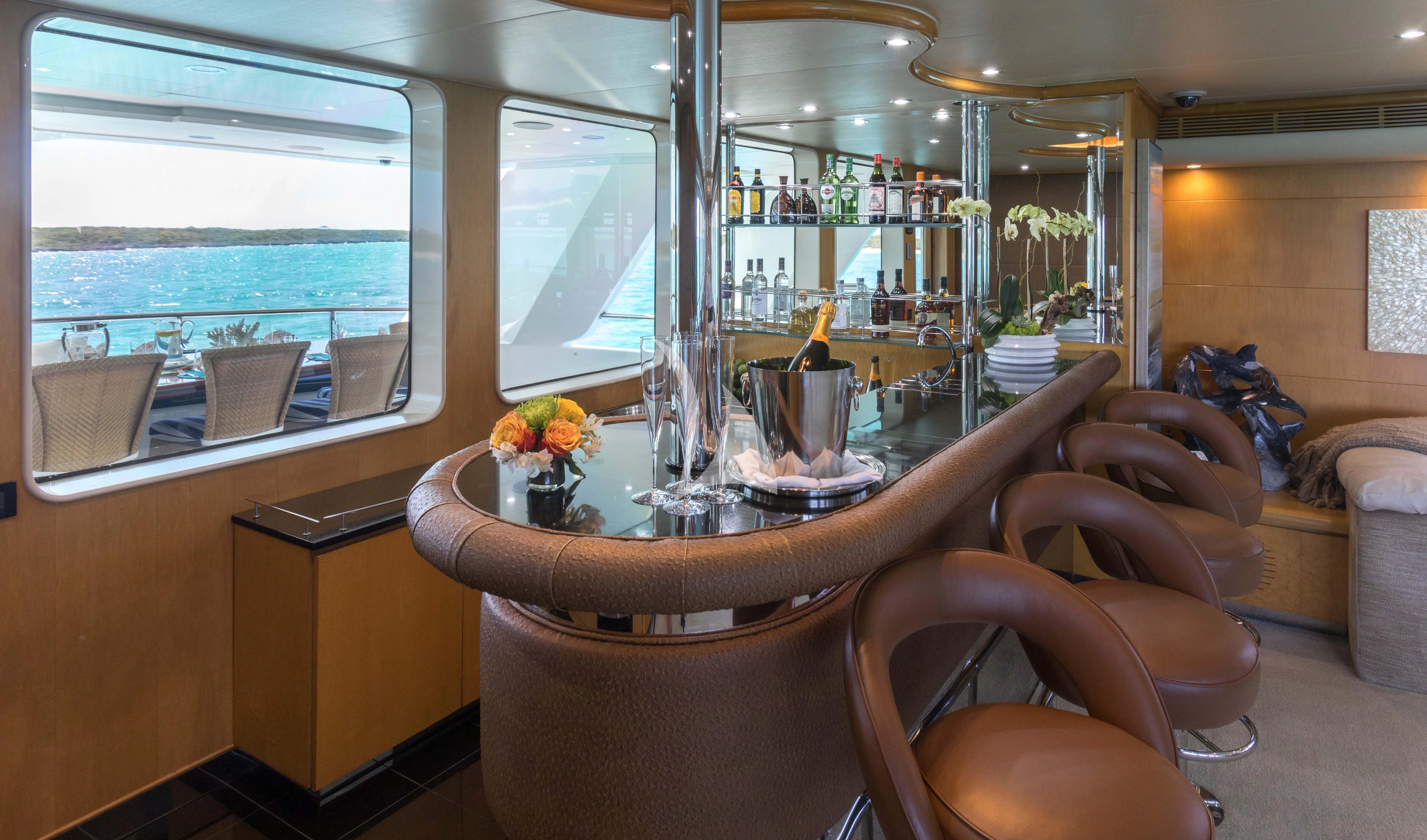 a dining table in a room aboard ISLAND HEIRESS Yacht for Charter
